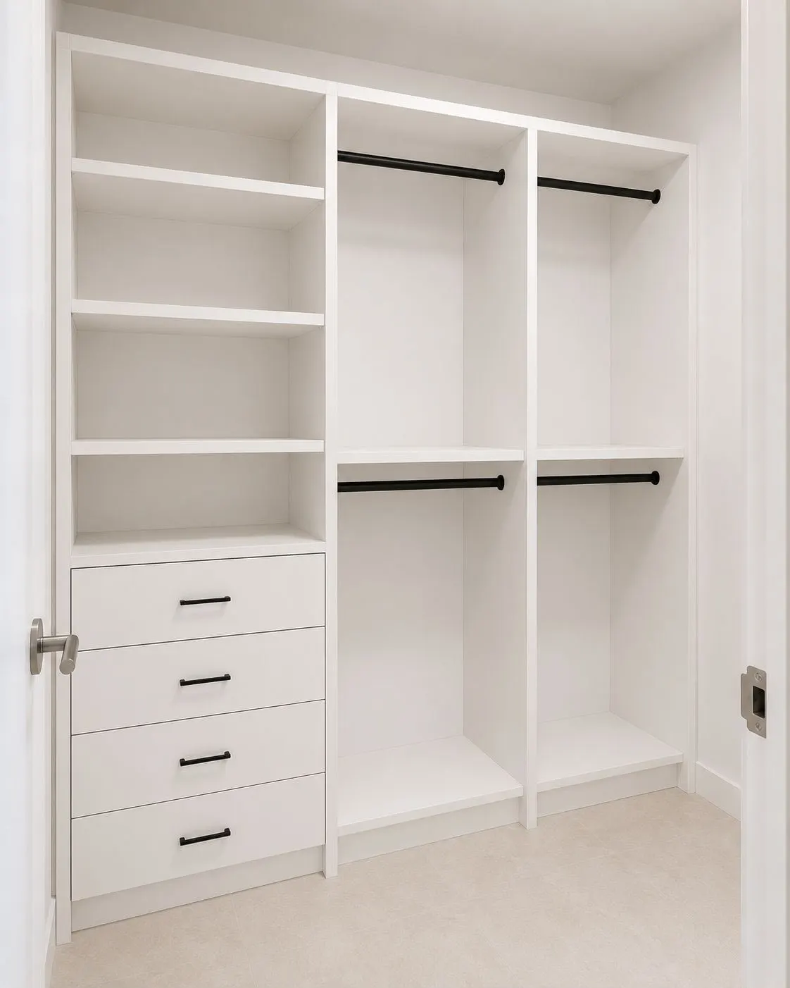 Reach-in closet in white with adjustable shelves, four drawers and two levels of hanging rails
